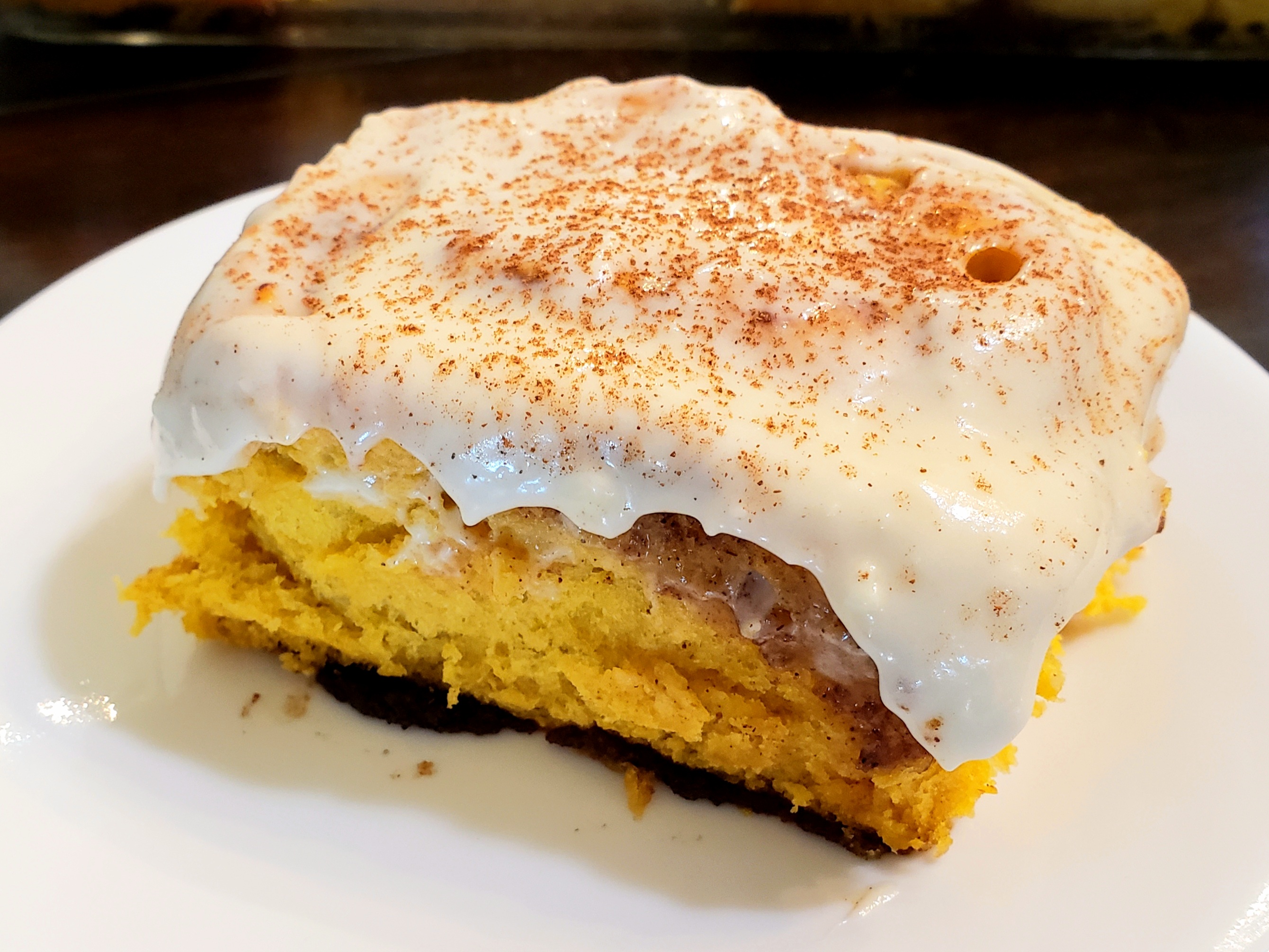 Pumpkin Pie Cinnamon Rolls with Maple Cream Cheese Icing